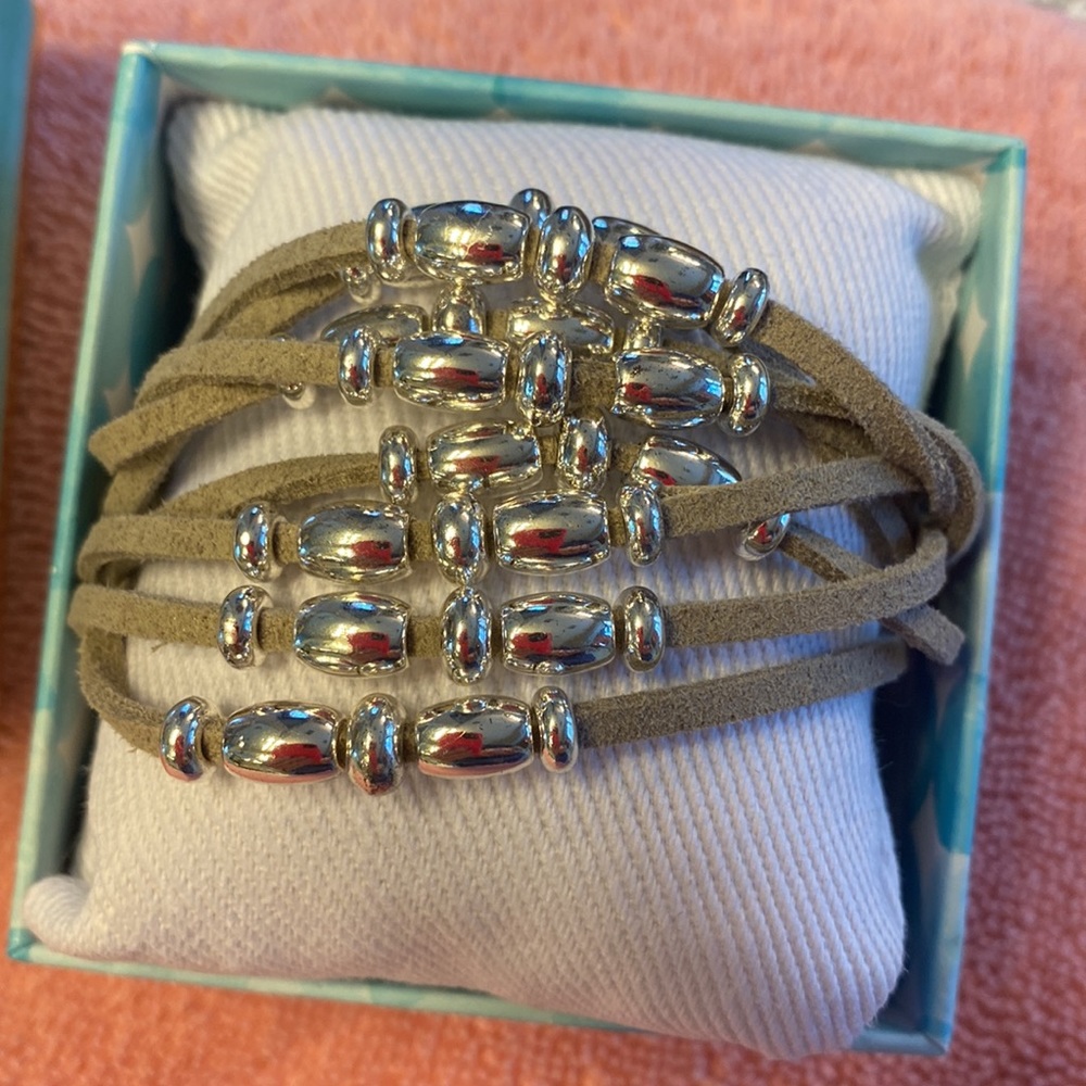 Beige and silver colored bracelet.